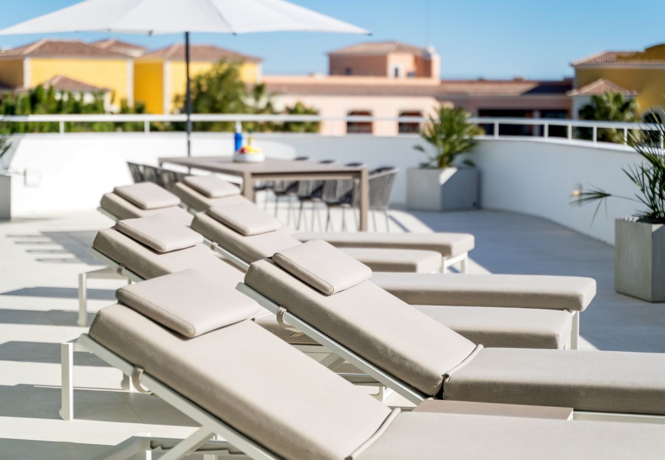 Sun loungers on the first floor terrace