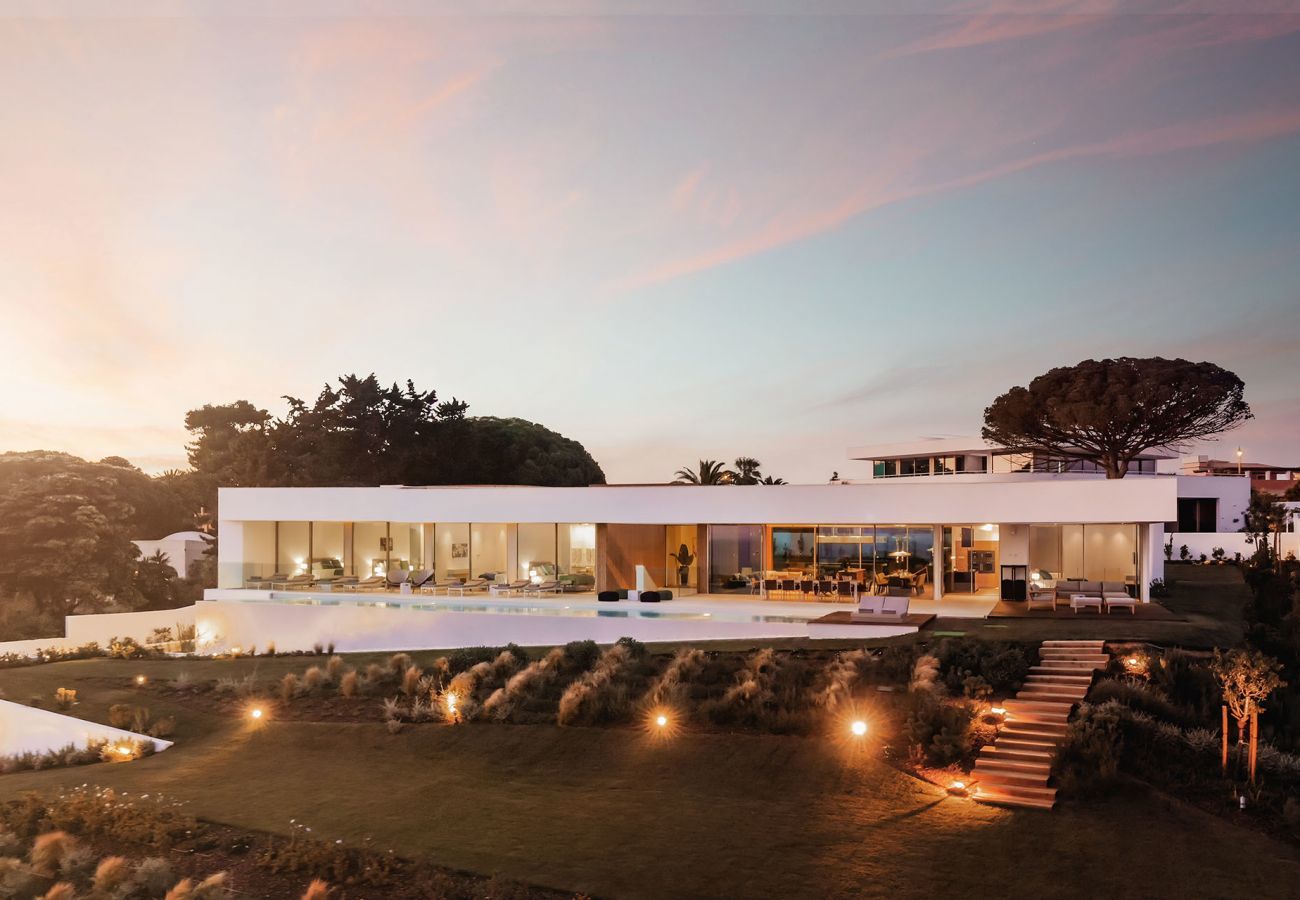Back view of the villa at twilight