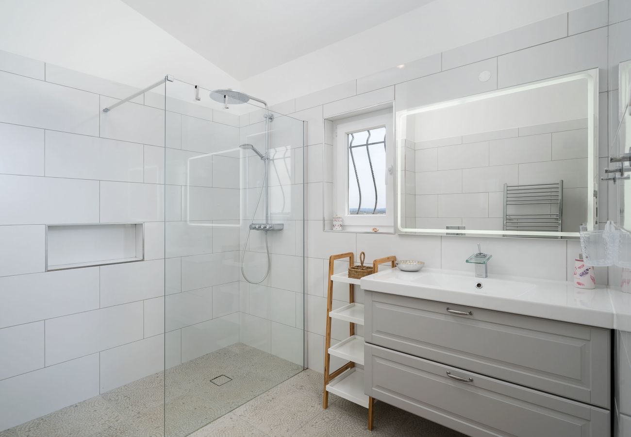 Bathroom with walk-in shower