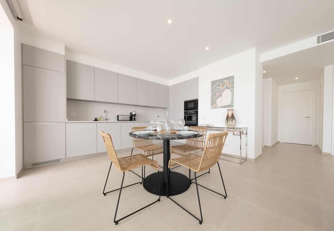 Dining table and kitchen